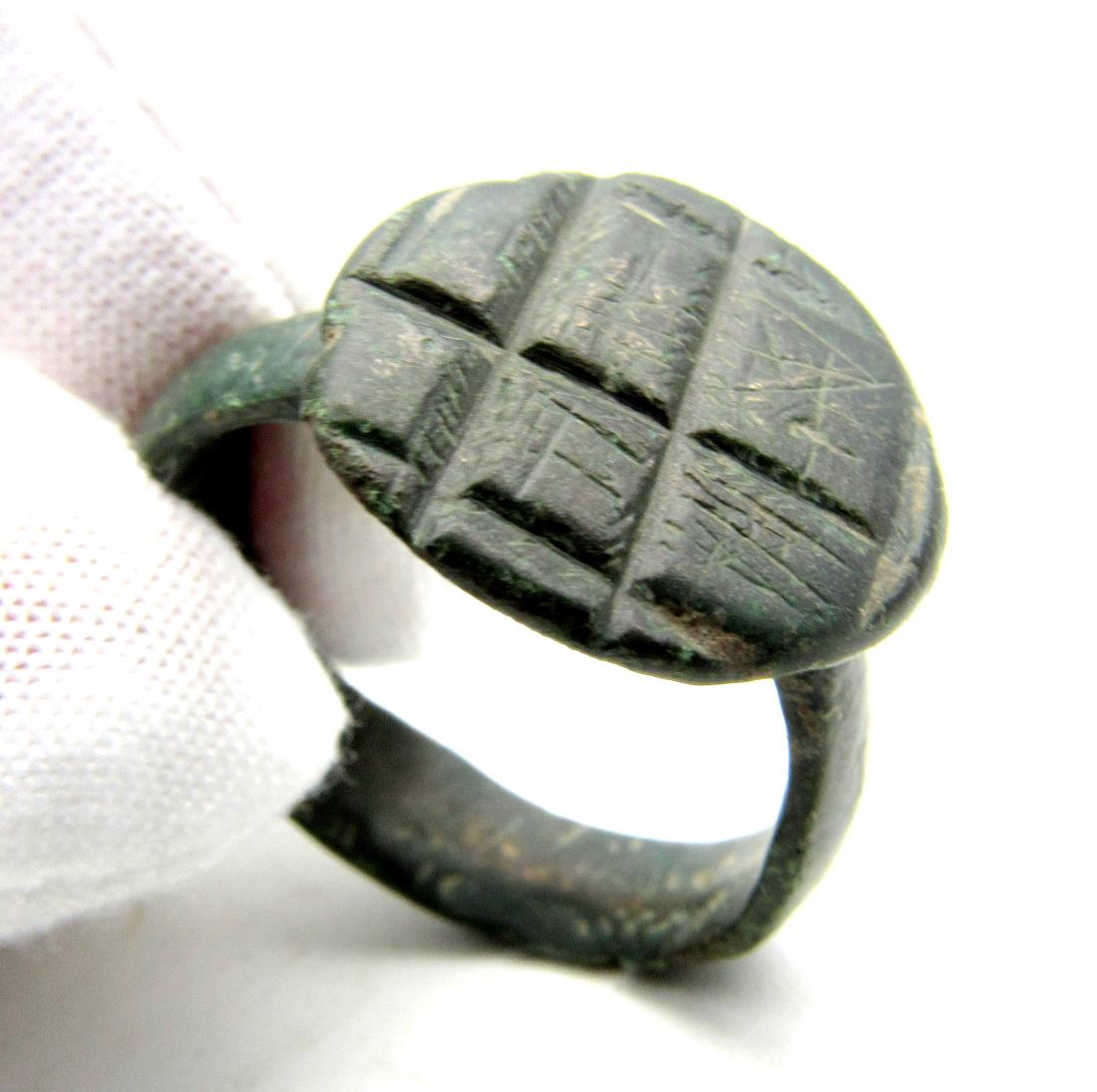 Norman Ring with Decorated Bezel.: Item: Norman Ring with Decorated Bezel. Date: ca. 1000 AD Material: Bronze Dimensions: 20mm (inner diameter) - 6.5grams Provenance/Additional Information: Purchased from an old British collection, pro