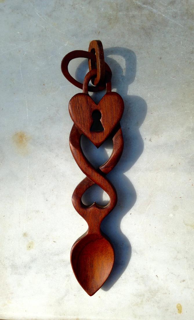 19th Century Folk Art Whimsy: 19thc Folk Art Whimsy 19thc carved walnut whimsy with hearts and keyhole Approximately 8" long. Please note that this lot has a confidential reserve. When you leave a bid in advance of the auction, su