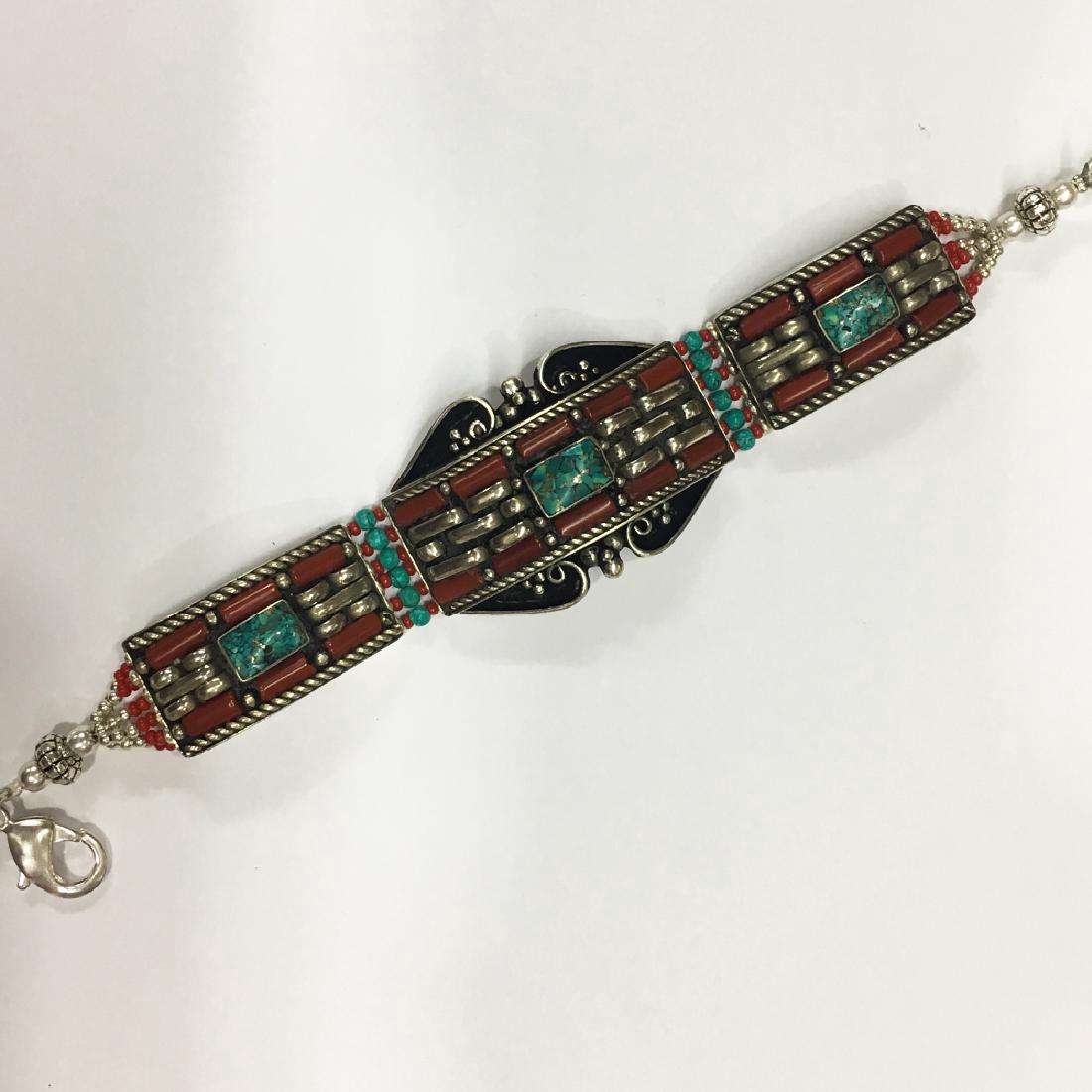 Handmade Tibetan Silver Turquoise Coral Bracelet: Item: Handmade Tibetan Boho Fashion Choker Bracelet Origin: Tibetan Handmade Stones: Turquoise & Coral Size (inches): 6-7 Please note that this lot has a confidential reserve. When you leave a bid in 