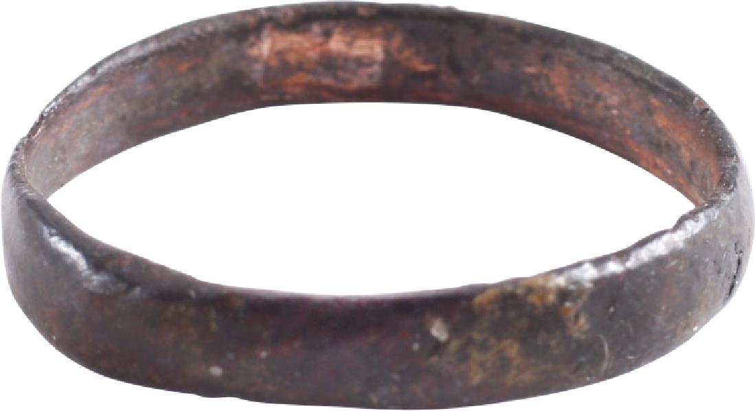 VIKING WOMAN'S WEDDING RING, 9th-10th CENTURIES: Bronze. Size 6 1/4. Broad section with rounded edges and nearly flat medial. Vikings exchanged rings on the pommel of the groom's sword. No Reserve: This lot starts at $1 and has no reserve as a court