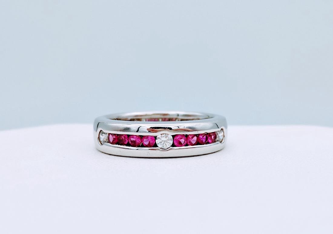 Sterling Silver Pink Sapphire Cubic Zirconia Ring: Item: 925 Sterling Silver Ring with Pink Sapphire and Cubic Zirconia Brand: Jean Lin Collection Metal Purity: 925 Sterling Silver Gemstones: Pink Sapphire and Cubic Zirconia Ring Size: 7 This Ring has