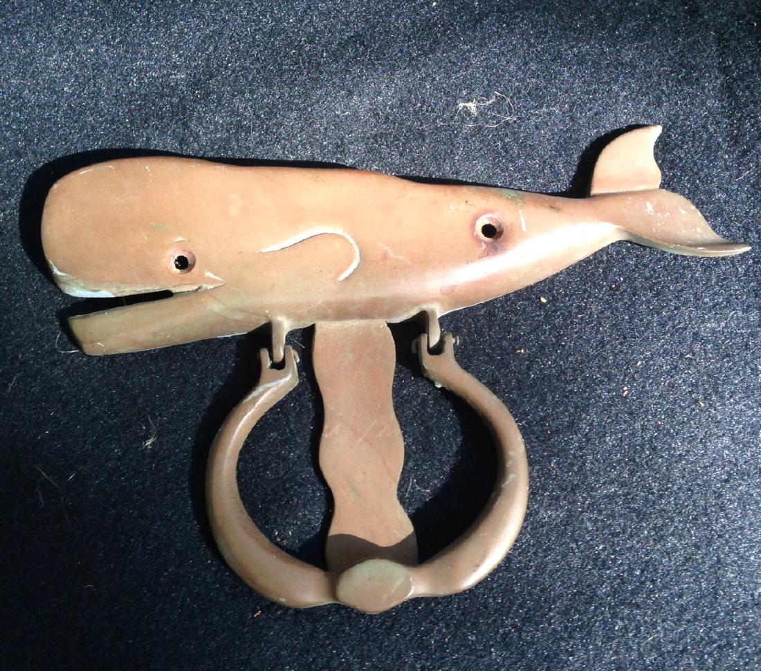 Brass Whale Door Knocker: Mid 20th century brass whale door knocker in VGC. 8"long x 5 1/2"high. Shipping: Domestic: Flat-rate of $15.00 to anywhere within the contiguous U.S. International: Foreign shipping rates are determin