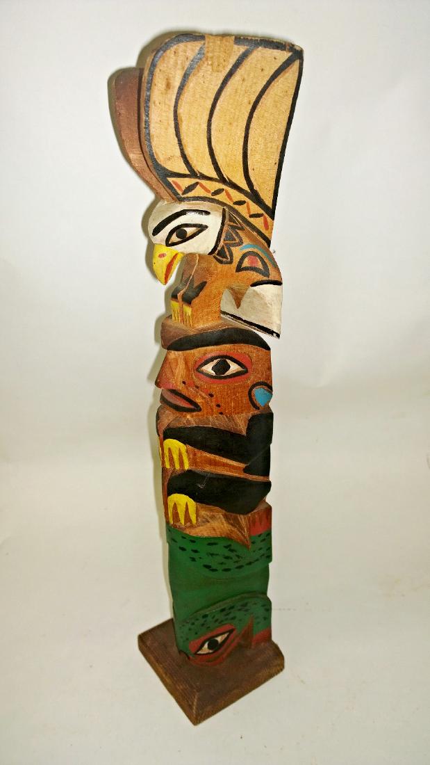 Totem from Mack's shop: Totem from Mack's shop c. 1956 Seattle WA Wood 15 high, 2.5 deep Labelled, great form and color Shipping: Domestic: Flat-rate of $20.00 to anywhere within the contiguous U.S. International: Foreign sh