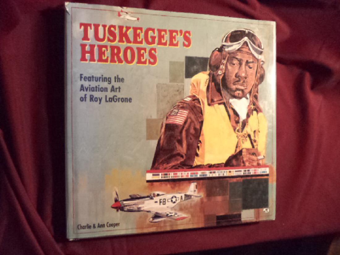 Tuskegee's Heroes. Inscribed by three Tuskegee pilots: Tuskegee's Heroes. Inscribed by three Tuskegee pilots. Featuring the Aviation Art of Roy LaGrone. Cooper, Charlie & Ann. Motorbooks. First edition. 4to. Illustrated in black, white and color. Importan