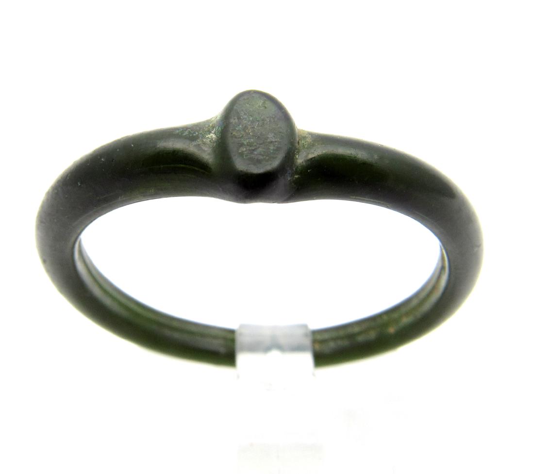 Byzantine Glass Ring: Date: c. 1200 AD Material: Glass Dimensions: 21mm (id) ; 1.1grams Provenance/Additional Information: From an old British collection, property of a London collector, acquired on British and European ar