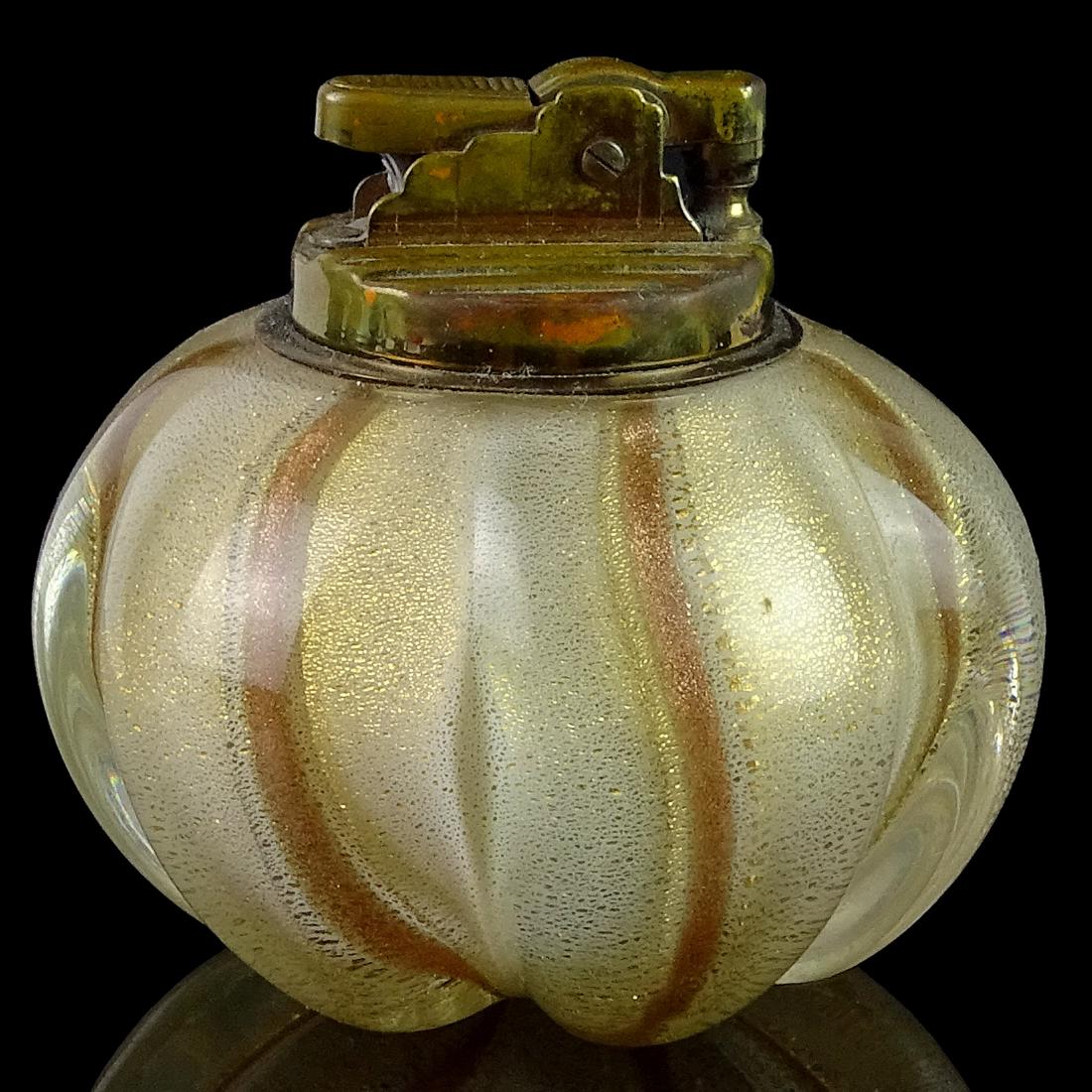 Barbini Murano Gold Copper Aventurine Flecks Italian: Beautiful Murano hand blown white, gold flecks and copper aventurine flecks Italian art glass lighter. Documented to designer Alfredo Barbini. The lighter mechanism is not working. Needs cleaning. Mea