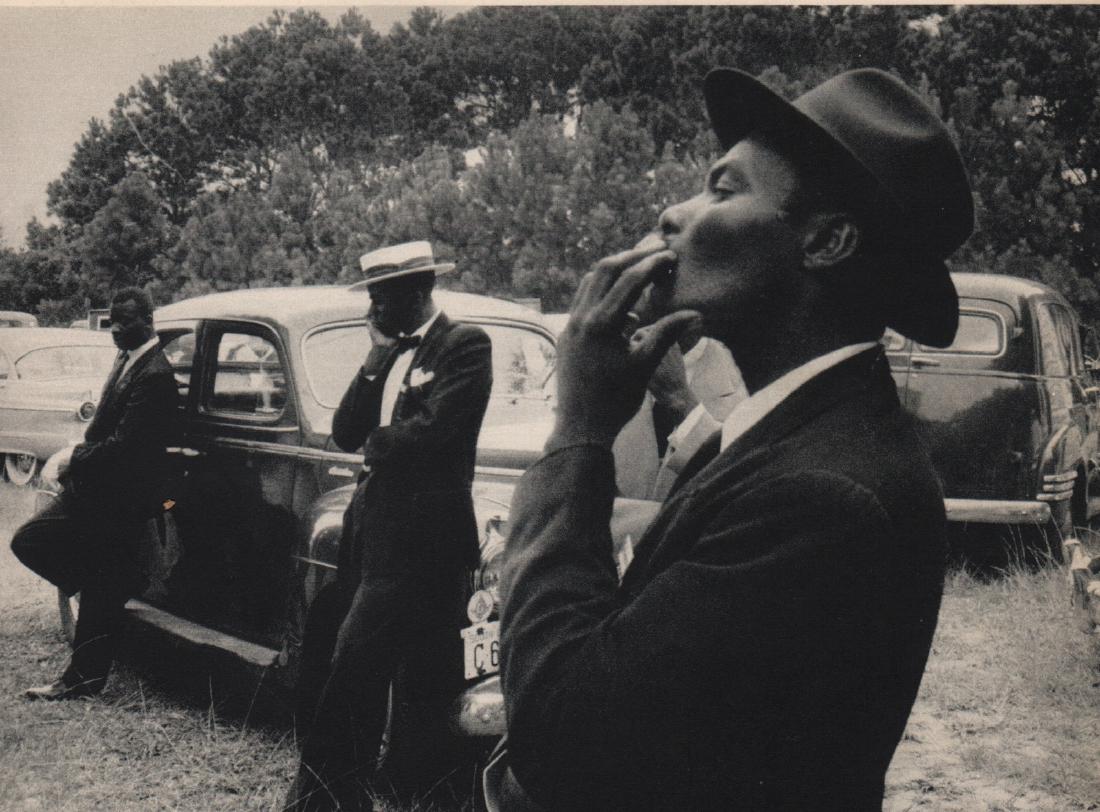 ROBERT FRANK - Funeral. St Helena, South Carolina: Artist: ROBERT FRANK Print Title: Funeral. St Helena, South Carolina Medium: Vintage Sheet-fed Gravure Printed in 1958 in France Image Size: 7.5" x 5" Robert Frank (b. 1924) is an American photographe
