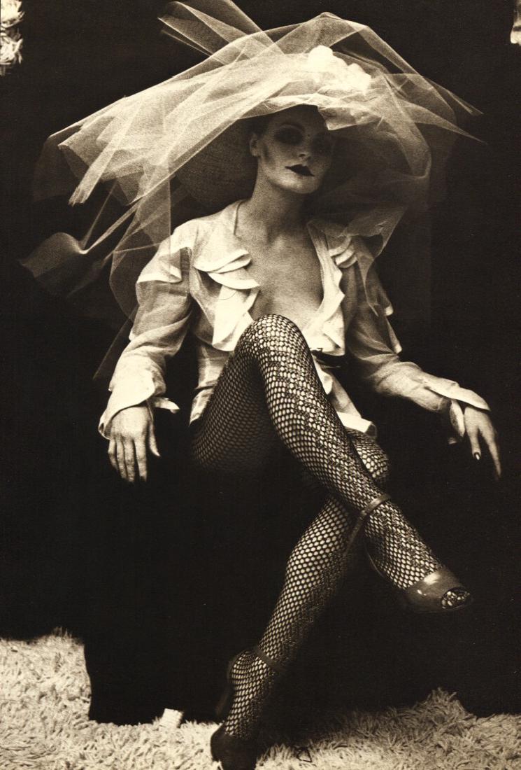 IRINA IONESCO - Fishnets: Artist: IRINA IONESCO Print Title: Fishnets Medium: Photo-Litho Printed in 1977 in France Image Size: 8" X 11" Irina Ionesco is a French photographer born in Paris, France. She was the daughter of Rom