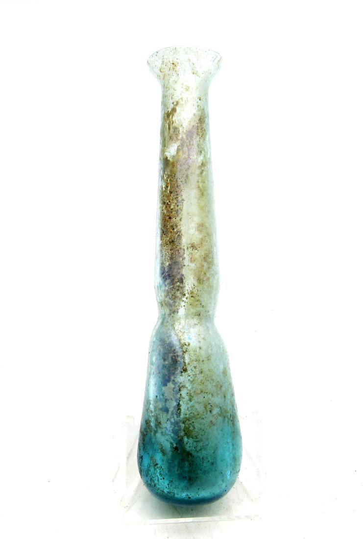 Roman Tear Catcher Glass Flask - "Lacrimarum": Date: ca. AD 200 Material: Glass Provenance: Obtained from an old British collection, purchased from a private collector in London, acquired between 1960 - 1990. Dimensions: 26x108mm ;25.9grams Rare A