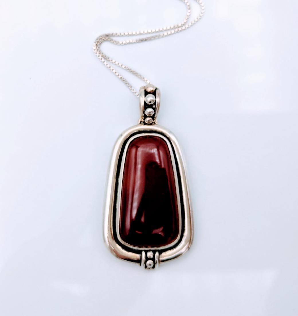 Sterling Silver Antique Style Carnelian Necklace: Item: Sterling Silver Italian Necklace with Antique Style Carnelian Pendant Brand: Jean Lin Collection Metal Purity: 925 Sterling Silver Gemstones: Carnelian Carnelian stone 26×14mmm. Shipping: Domes
