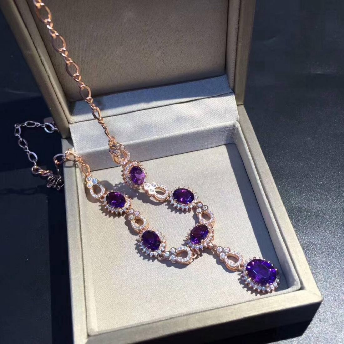 Sterling Silver Amethyst Zircon Pendant Necklace, 7.5ct: Main Stone: Amethyst Main Stone Size:6*8/8*10mm Color: Purple Carat Total Weight: 7.5ct Cut: Very Good Secondary Stone: Zircon Color Grade: J - I Clarity: SI1 - SI2 Shipping: Domestic: Flat-rate of $2