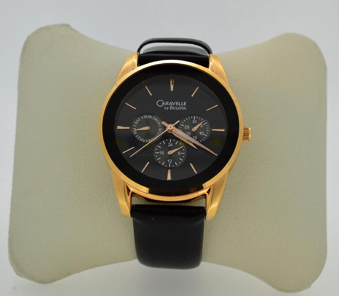 Caravelle Gold Tone Steel Men's 40MM Wristwatch: Item: Men's 40MM Caravelle Wristwatch Model: Caravelle Movement: Quartz Case Metal: Gold plated Stainless Steel Case Size: 40mm diameter Dial: Arabic Bracelet Length: 10" Made by Bulova, Rose Gold Pla