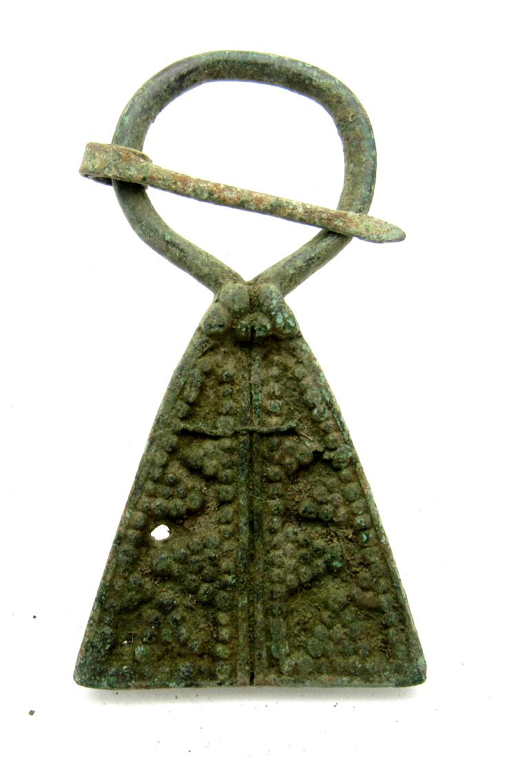 Medieval viking era penannular omega brooch: Date: ca. 900 - 1100 AD Material: bronze Provenance: Purchased from an old British collection; acquired from B.C.F (Birmingham) Dimensions: 56mm; 11.2grams Medieval viking era penannular omega brooch.