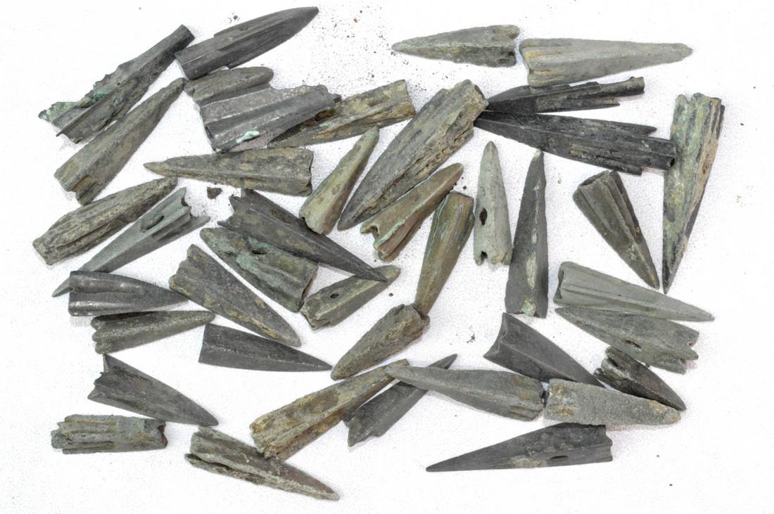 Selection of 40 Ancient Celtic/Scythian tri-lobed: Date: 400 BC - 100 AD Material: bronze Provenance: Purchased from an old British collection; acquired from B.C.F (Birmingham) Dimensions: 13-25mm; 69grams Selection of 40 Ancient Celtic/Scythian tri-l