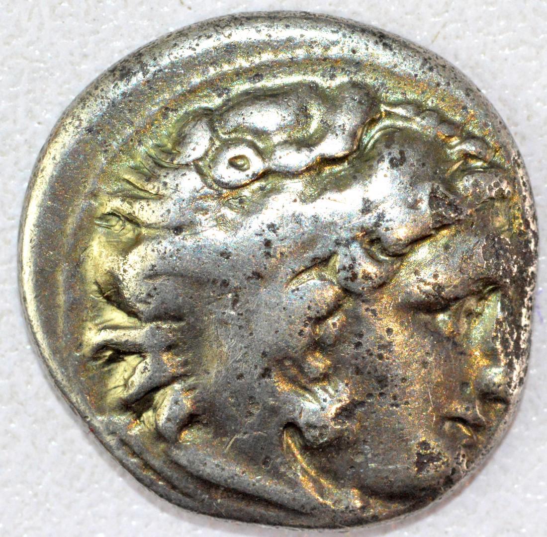 Ancient Greek Drachm of Alexander III the Great: Date: ca. 4th C BC Material: silver Dimensions: 18mm ; 4.2grams Ancient Greek Drachm of Alexander III the Great, rvs. Zeus on throne. Superb Ancient Coin in Great Condition. Shipping: Domestic: Flat-r