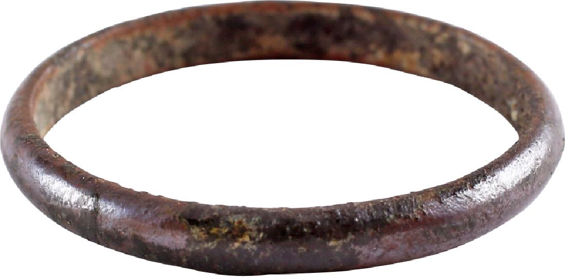 VIKING MAN'S WEDDING RING 866-1067 AD: Narrow width of rounded section. Bronze of copper rich alloy and showing as brown with good patina. Large size 11 1/2. No Reserve: This lot starts at 1 and has no reserve as a courtesy so that collect