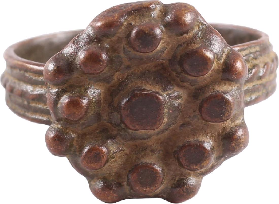 GREAT PLAGUE OF LONDON RING: Bronze. Size 5 1/2. Early Renaissance, 15th-17th century, probably English. Revolutionary in its construction with the band of rolled brass/bronze, with a pattern imparted by the roller. The bronze fl