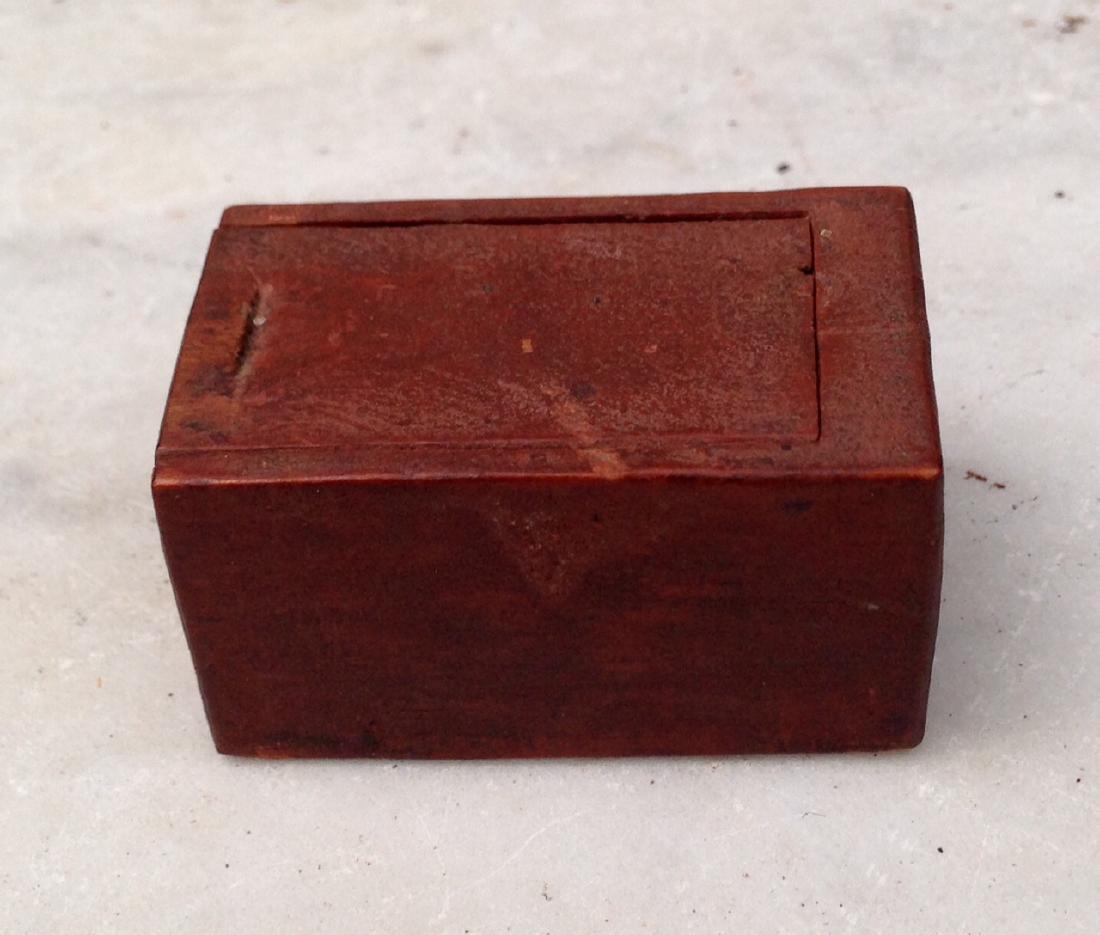 Americana Miniature 19th Century Carved Slide Box: Americana miniature 19th century carved slide box in original old red paint Probably for spruce gum. Bottom carved from one piece wood. VGC. 1 3/4" long by 1 1/8" wide by 7/8" high. Shipping: Domestic