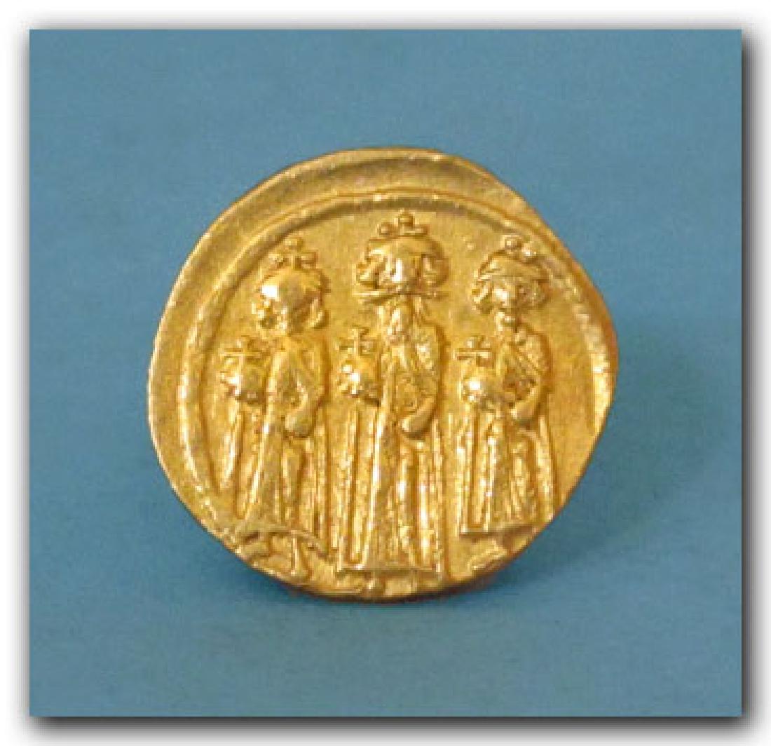Gold Solidus, Heraclius & His Sons, Mint of: Date & Origin: Byzantine, Mint of Constantinople, 5 Oct. 610- 11 Jan. 641 A.D. Material: Gold, 4.5grms Dimensions: 2 cm D - 13/16 inch Provenance: Provenance: Private UK collection, 1990-2010 Obv:Empe