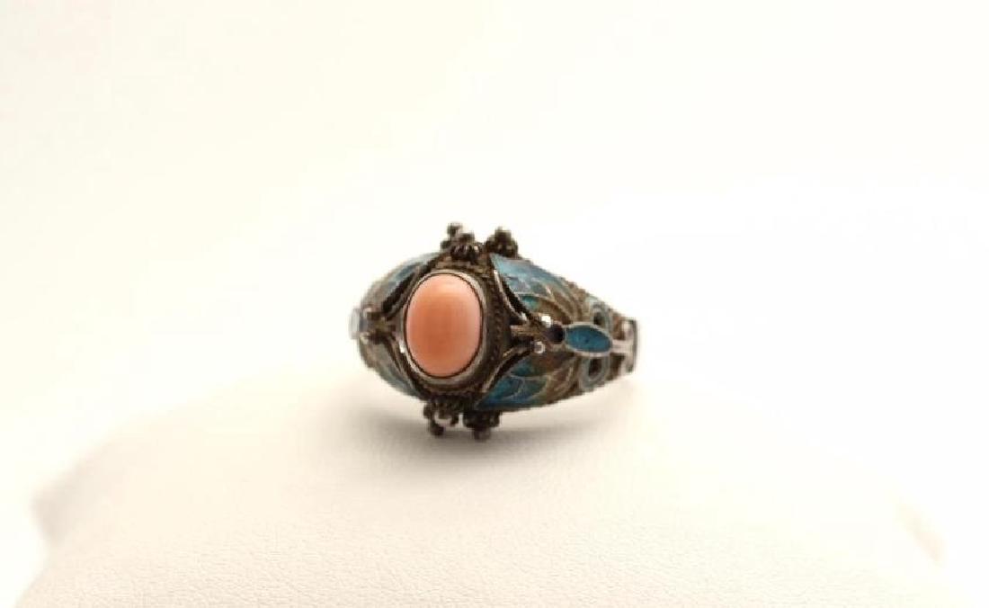 Sterling Silver Filigree Coral Enamel Butterfly Ring: A very pretty vintage Chinese enameled butterfly ring with a coral stone and filigree design. Marked China and 925. There is another mark on it but is illegible. Size 11 Shipping: Domestic: Flat-rate