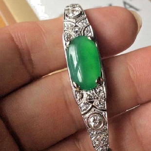 Antique 18K White Gold GIA Jadeite Bracelet: Incredible set, bright green color, translucent, very valuable and fine with high quality jadeite jade in antique bracelet. The gem has bright green color and fine translucency, uniform color, 16 x 9