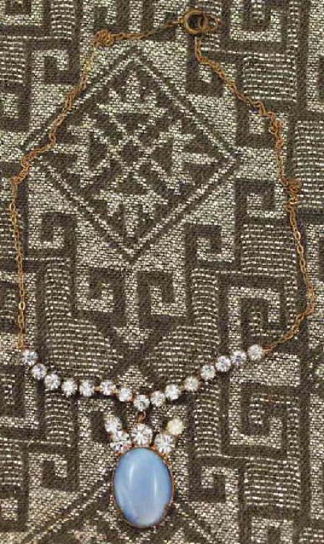 Vintage Moonstone Crystal Necklace: Enchanting necklace original of period 1920's. It is made up of very light rings, one moonlight pendant and 20 gems (see enlargements). Size when closed: 7.48x3.94x0.2 inches. Weight of the necklace: