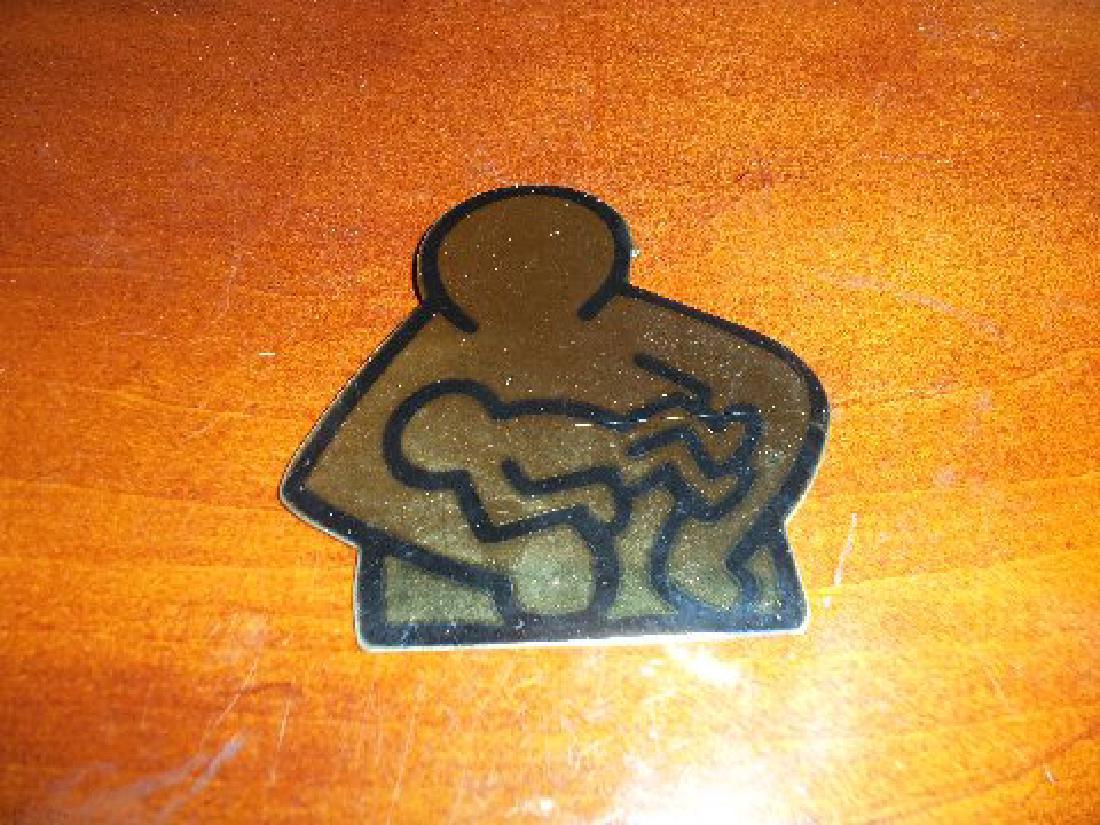 Keith Haring Pop Shop Mother & Child Metal Decoration: Keith Haring Pop Shop Mother With Child Metal Decoration With Gold Mirror Finish Measures 3 1/2" tall x 3 1/2" wide and has a hook on the back Pop Shop Mother With Child Metal Decoration With Gold Mir