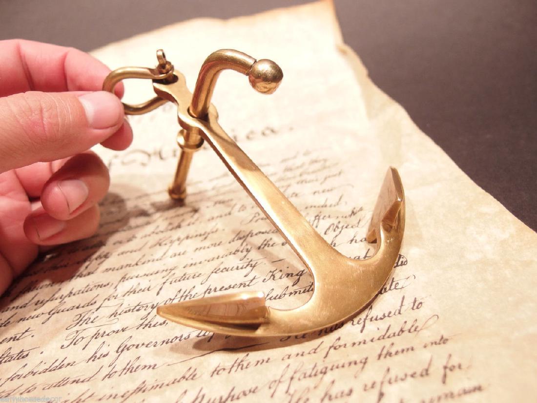5" Nautical Anchor Paperweight: 5" long x 4" Wide Very accurate and well made reproduction of an antique paperweight. All solid brass, darkened to look old. Certainly easy to wonder its age Shipping: Domestic: Flat-rate of $5 to any