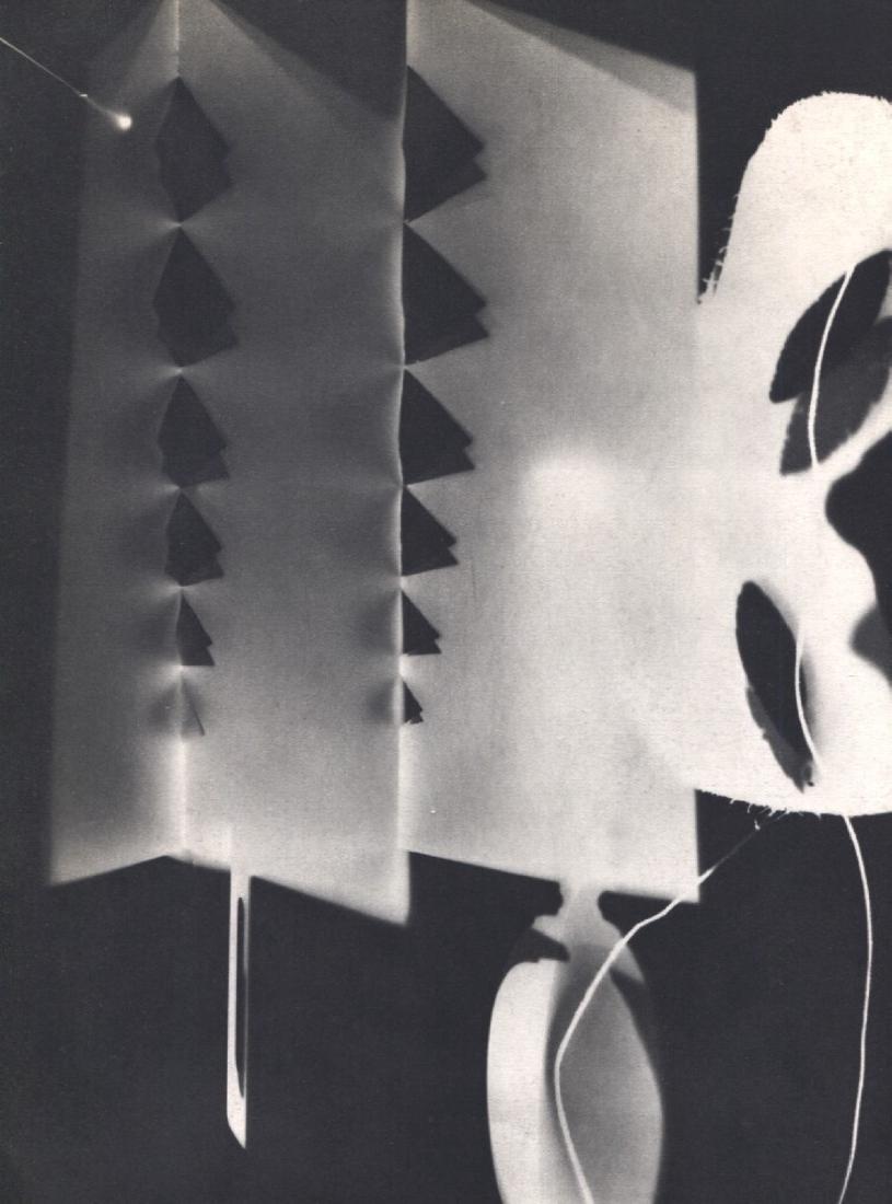 MAN RAY - Rayograph: Artist: MAN RAY Print Title: Rayograph Medium: Sheet-fed Gravure Printing Date: 1934 Printed in France Image size approx. 7.5 x 10.5 inches Man Ray, original name Emmanuel Radnitzky, was born on Augus