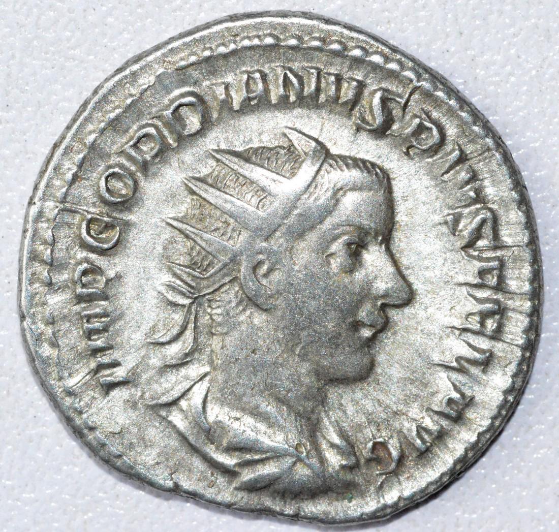Ancient Roman Antoninianus Coin - Gordian III: Date: 3rd C AD Material: Silver Provenance: Obtained from an old British collection, acquired from B.C.F. (Birmingham). Dimensions: 22mm; 4.2grams Ancient Roman Antoninianus Coin - Gordian III AR rv. 