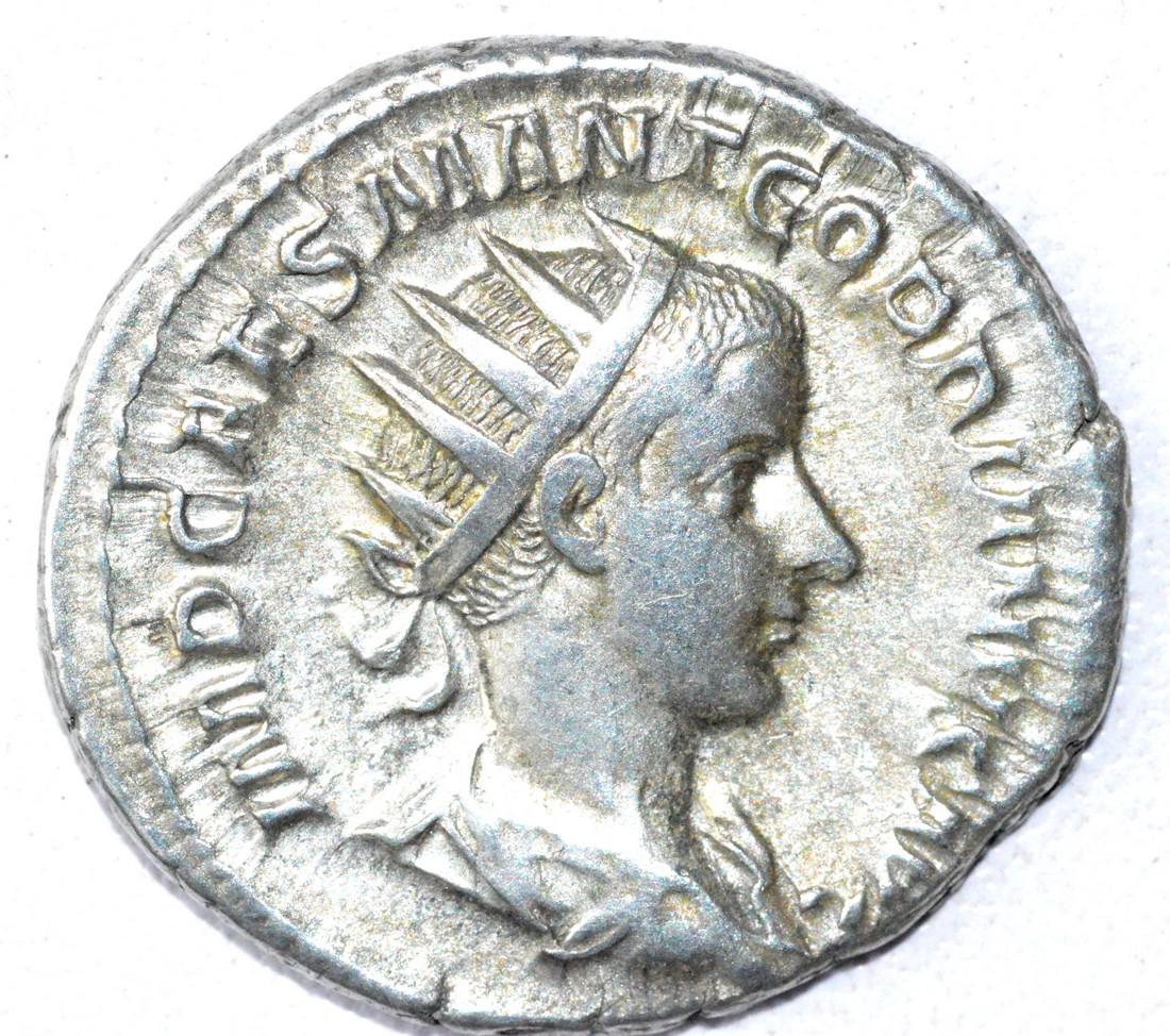 Ancient Roman Antoninianus Coin - Gordian III: Date: 3rd C AD Material: Silver Provenance: Obtained from an old British collection, acquired from B.C.F. (Birmingham). Dimensions: 23mm; 4.3grams Ancient Roman Antoninianus Coin - Gordian III AR rv. 