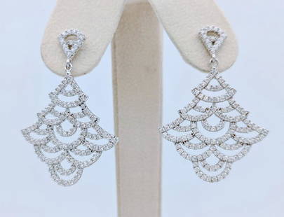 Sterling Silver Cubic Zirconia Christmas Tree Earrings: Item: Sterling Silver Christmas Tree Designed Earrings with Cubic Zirconia SpecksBrand: Jean Lin CollectionMetal Purity: 925 Sterling SilverGemstones: Cubic Zirconia Shipping:Domestic: Flat-rate of