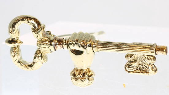 Antique Victorian 14K Gold Watch Key Brooch, c1860: Item: Victorian watch key, made into a brooch - anno 1860Condition: good, small dent in the hand Style: Victorian Era: ca. 1860 Material: 14K yellow gold (touchstone tested) Hallmarks: No trace.