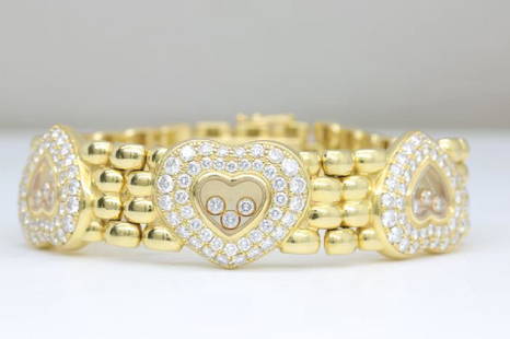 Chopard Happy Diamonds 18K Gold Heart Bracelet, 4ctw: Item: Chopard - 18k gold Happy Diamonds 3 Hearts bracelet with approx. 4.00 ct. in E/VVS1 brilliantSet with 135 brilliant cut finest white diamonds Original with hallmarks and reference