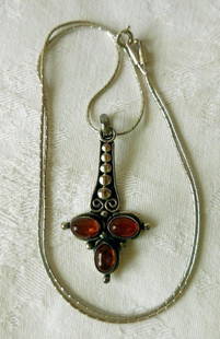 Antique Sterling Silver & Amber Necklace, c1910: Item: Sterling Silver & Amber Necklace Maker: Unknown Origin: Unknown Date/Period: Ca 1910 Materials: Sterling Silver, Natural Amber Size: Chain 18 Inches Long, Pendant 1 1/2 Inches Long This Pendant