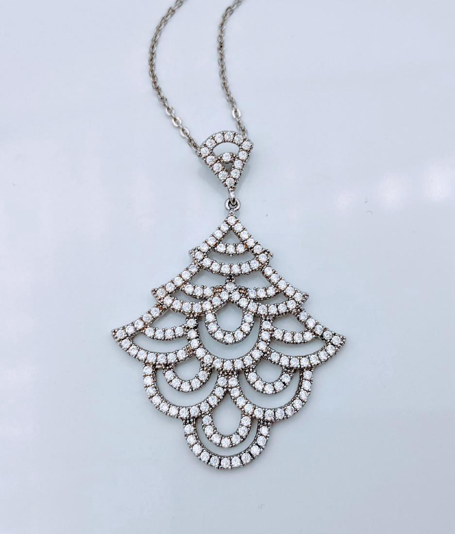 Sterling Silver Cubic Zirconia Christmas Tree Necklace: Item: Sterling Silver Necklace and Christmas Tree Designed Pendant with CZ specks Brand: Jean Lin Collection Metal Purity: 925 Sterling Silver Gemstones: Cubic Zirconia Shipping: Domestic: Flat-rate o