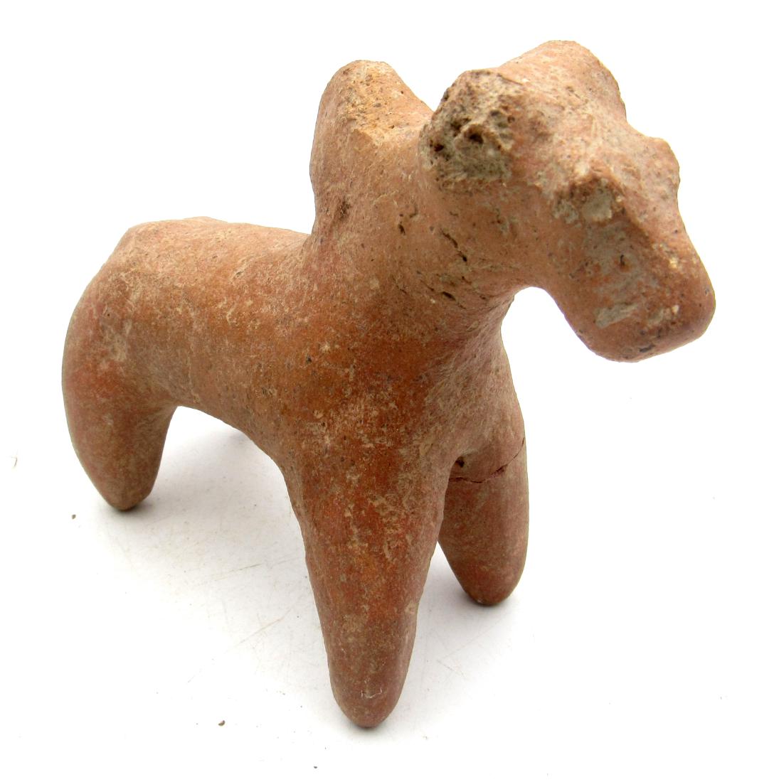 Ancient Indus Valley horse idol: Date: Circa 3300 - 2000 BC Material: terracotta Provenance: Obtained from an old British collection, purchased from a gentleman in Kent Dimensions: 102mm; 143grams Rare Ancient Indus Valley horse idol