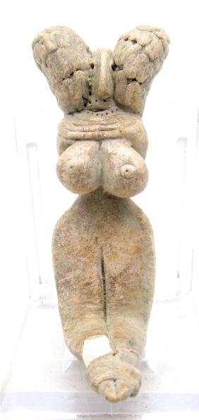 Ancient Indus Valleyseated female idol with bundles: Date: Circa 3300 - 2000 BC Material: terracotta Provenance: Obtained from an old British collection, Acquired from a private London collector, acquired between 1960-1990. Dimensions: 66mm; 18grams Ver