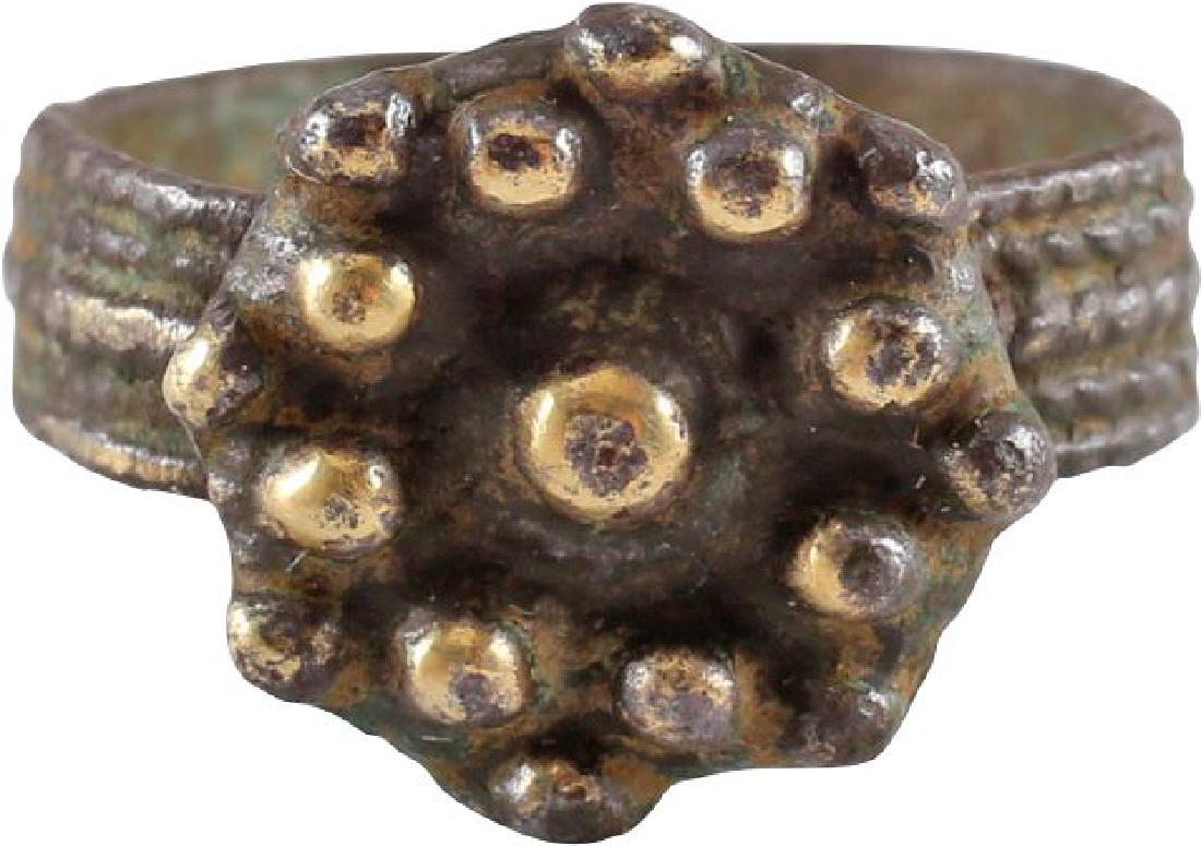 GREAT PLAGUE OF LONDON RING 15th-17th CENTURY: Bronze. Early Renaissance, probably English. Revolutionary in its construction with the band of rolled brass/bronze, with a pattern imparted by the roller. The bronze flower bud top cast separately an