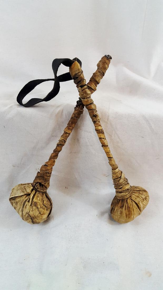 Pair of Native American rawhide covered clubs (1 of 3)