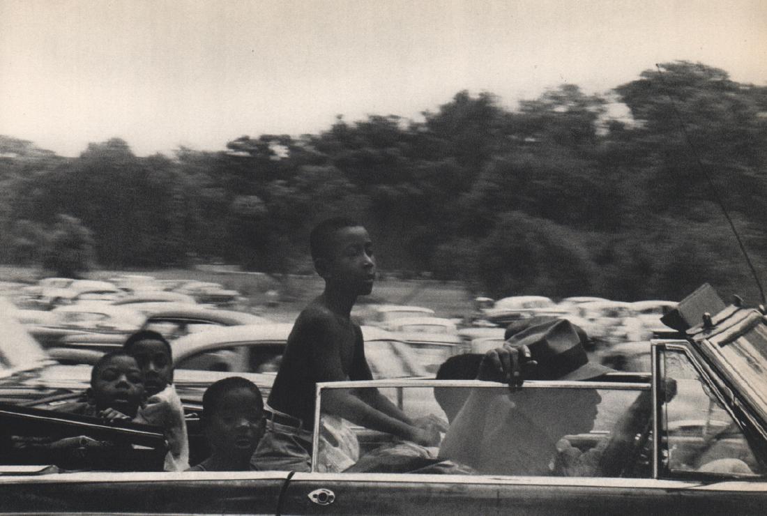 ROBERT FRANK - Detroit, Michigan: Artist: ROBERT FRANK Print Title: Detroit, Michigan Medium: Sheet-fed Gravure Printing Date: 1958 Printed in France Image Size: 7.5" x 5" Robert Frank (b. 1924) is an American photographer and documen