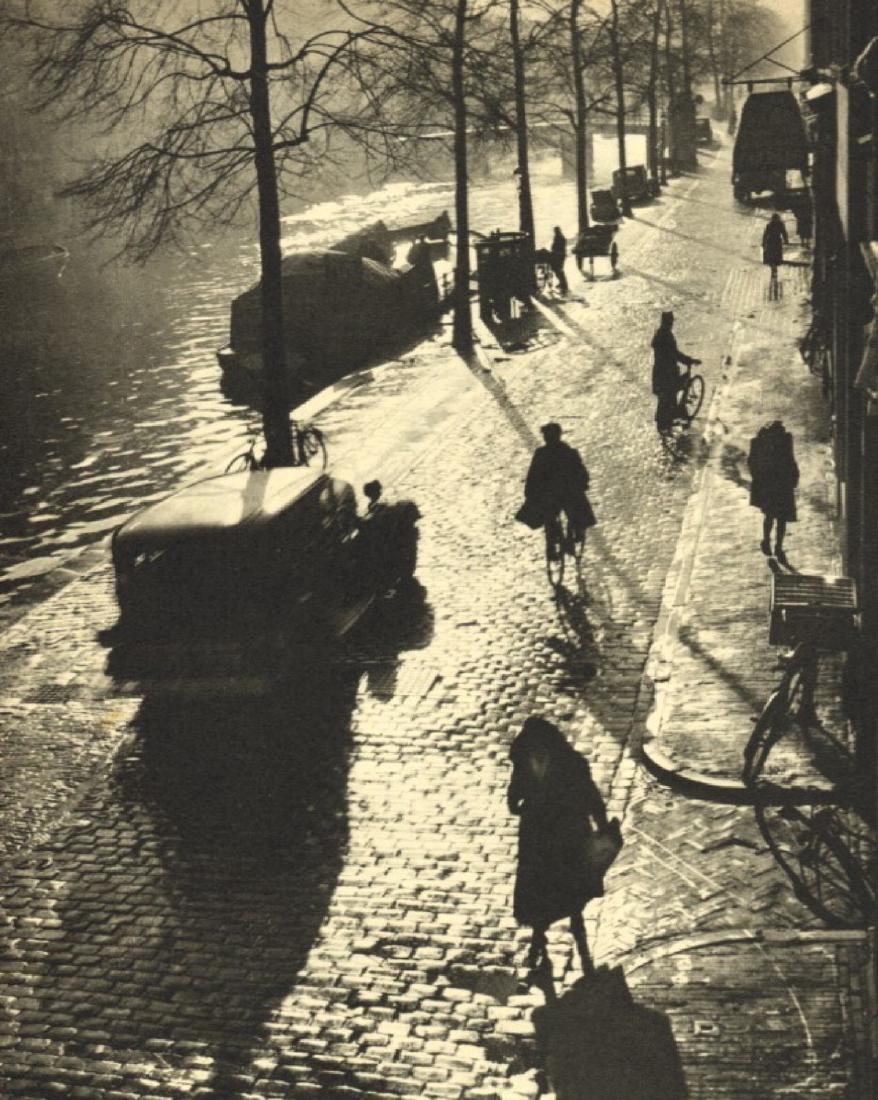 WOLFGANG SUSCHITZKY - A Quay in Amsterdam: Artist: WOLFGANG SUSCHITZKY Print Title: A Quay in Amsterdam Medium: Sheet-fed Gravure Printing Date: 1940 Printed: Great Britain Image Size: 6.5 X 8 inches Wolfgang Suschitzky(1912-2016) was a docume