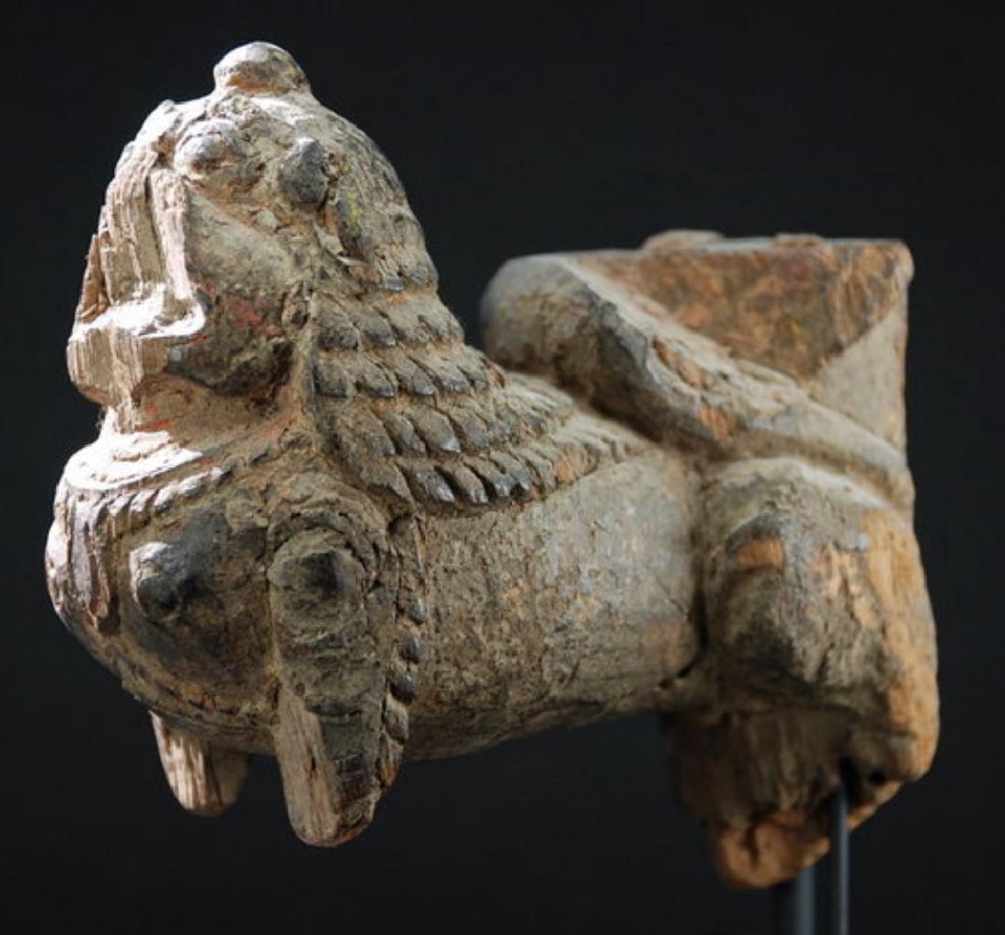 Antique Nepalese Snarling lion, 17th C: Item: Snarling lion Origin: Nepl Date: 17th century Malla Period Materials: Wood with polychrome traces Size: height 10,8 cm - length 10,4 cm Please note that this lot has a confidential reserve. When