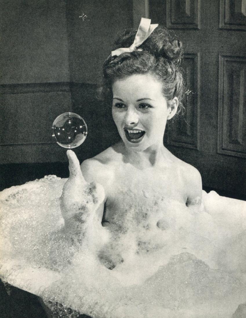 PETER STACKPOLE - Bubble Bath: Artist: PETER STACKPOLE Print Title: Bubble Bath Medium: Sheet-fed Gravure Printing Date: 1960 Printing Location: Japan Image Size: 7.5 x 9.5 inches Peter Stackpole(1913-1997) was an American photogra