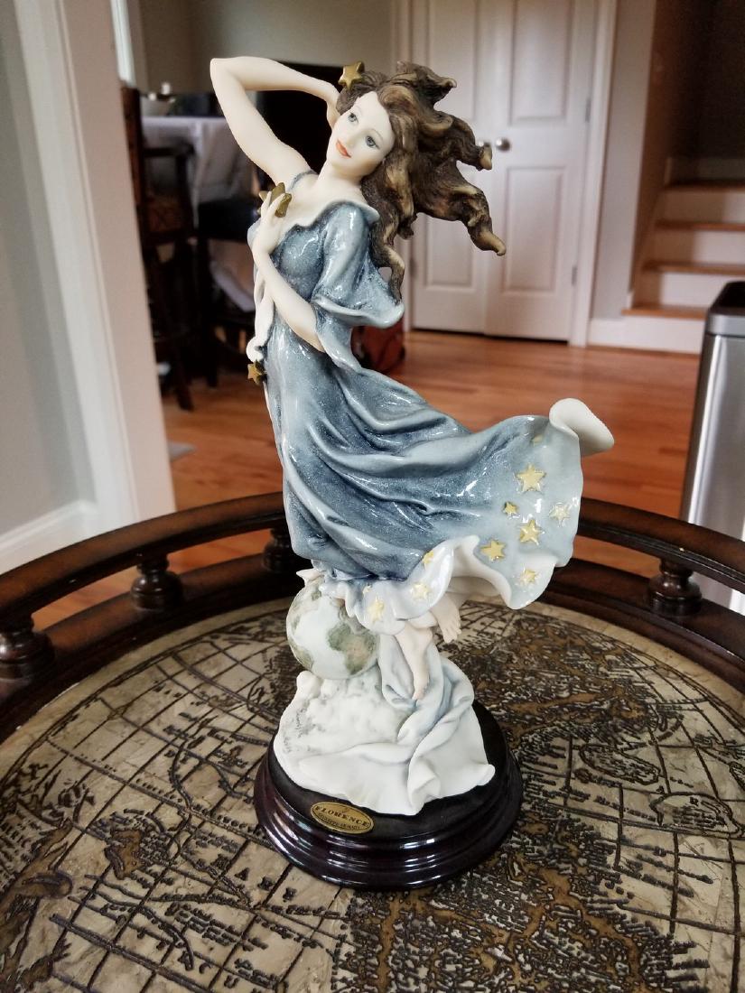 Giuseppe Armani: 2000 Figurine Celeste in Box: Size: 12x4.5 #1302C, with certificate and stand Please note that this lot has a confidential reserve. When you leave a bid in advance of the auction, submit your maximum. The bidder who has submitted 