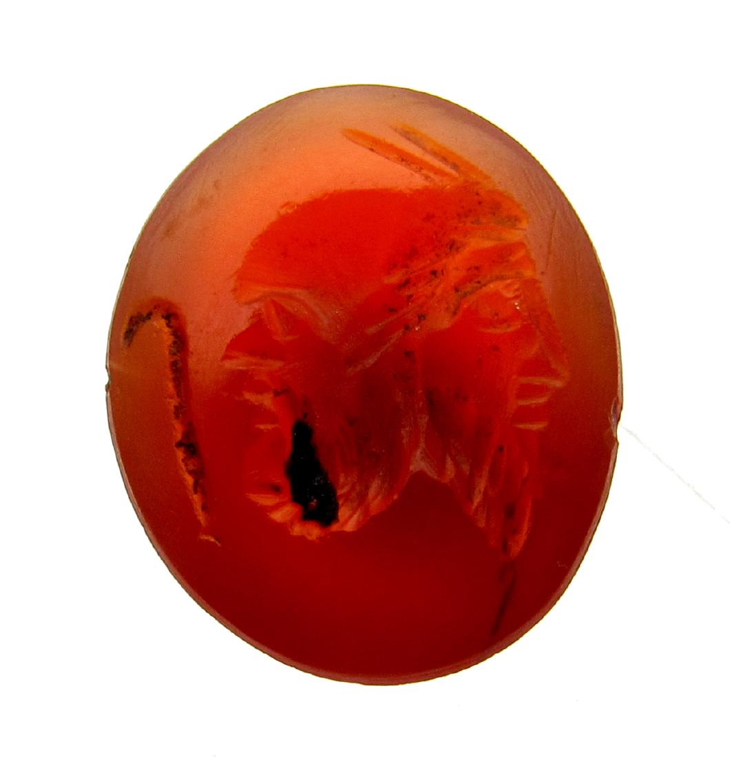 Roman Carnelian Intaglio - Satyr and Pan: Date: ca. 100 - 300 AD Material: Carnelian Provenance: Obtained from an old British collection, purchased from a gentleman in London. Dimensions: 14mm: 1.2grams Roman Carnelian Intaglio - Gods of Happ
