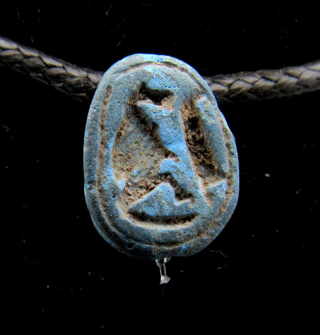 Ancient Egyptian Scarab with Hieroglyphs: Date: ca. 1500 BC Material: Stone Provenance: Obtained from an old British collection, purchased from a gentleman in London. Dimensions: 11mm: 0.8grams Ancient Egyptian Scarab with Hieroglyphs, Expert