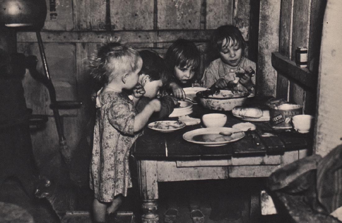 RUSSELL LEE - Children's Mealtime, FSA image: Artist: RUSSELL LEE Print Title: Children's Mealtime, FSA image Medium: Sheet-fed Gravure Printing Date: 1936 Printing Location: USA Image Size: 8 x 5.25 inches Russell Lee (1903-1986) was an American