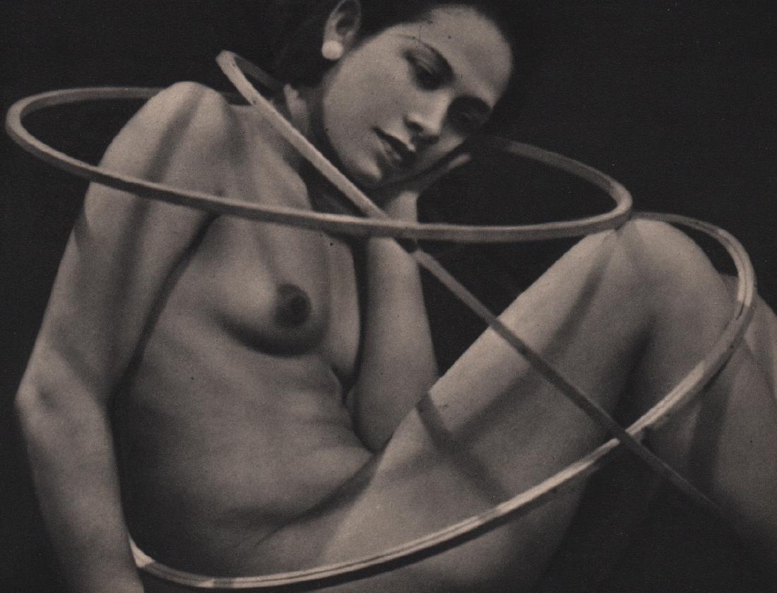 MAN RAY - Ady with Hoops: Artist: MAN RAY Print Title: Ady with Hoops Medium: Sheet-fed Gravure Printing Date: 1937 Printed: France Image size approx. 6.5 x 5 inches Man Ray, original name Emmanuel Radnitzky, was born on Augus