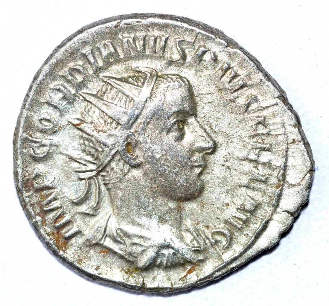 Gordian III AR Antoninianus, rv. Apollo: Date: 3rd C AD Material: Silver Provenance: From an old British collectom, acquired on German and Austrian art markets. Dimensions: 23mm; 5grams Gordian III AR Antoninianus, rv. Apollo. Authentic Anci